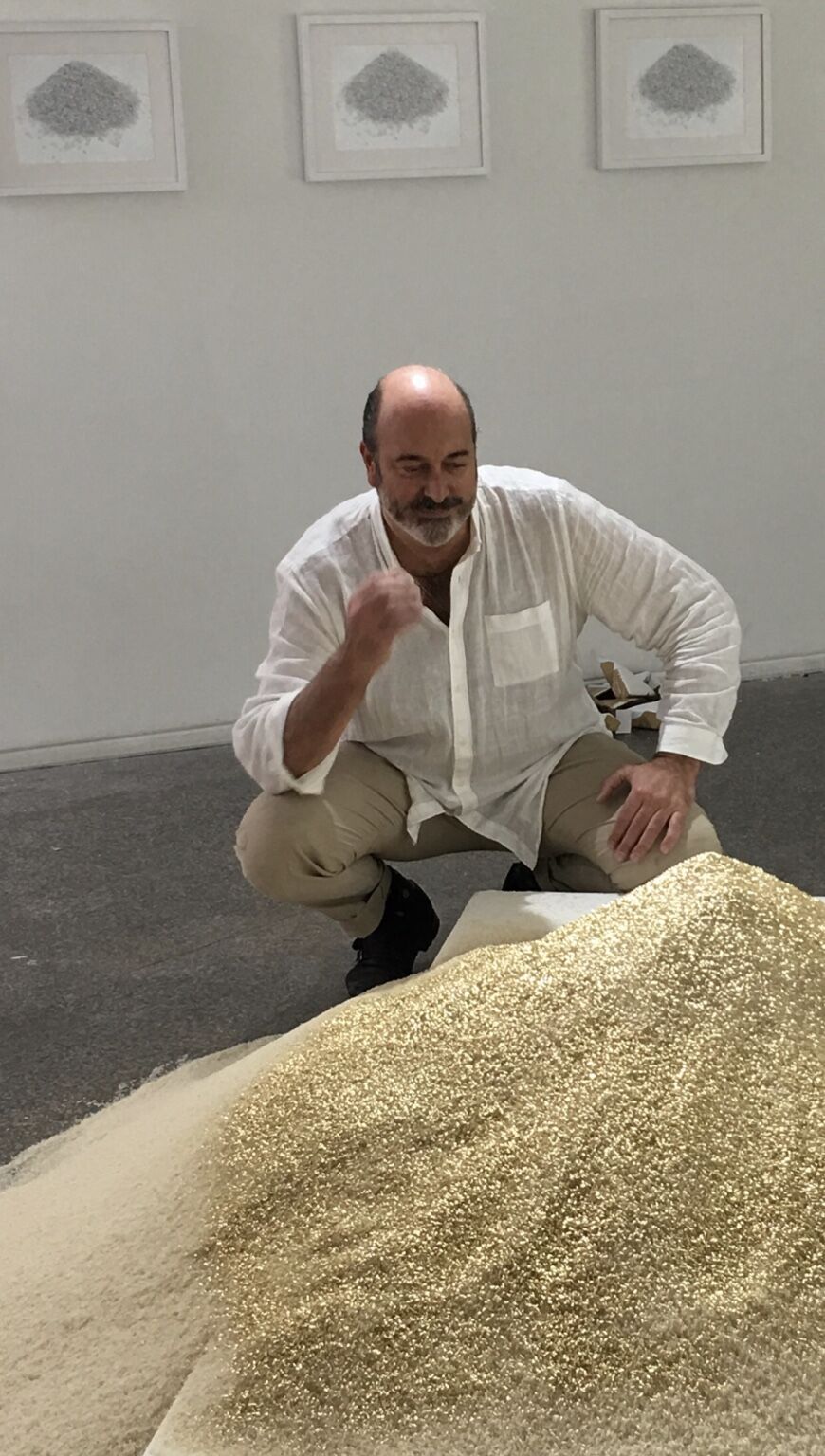 José Cosme beside the Golden Rice installation
