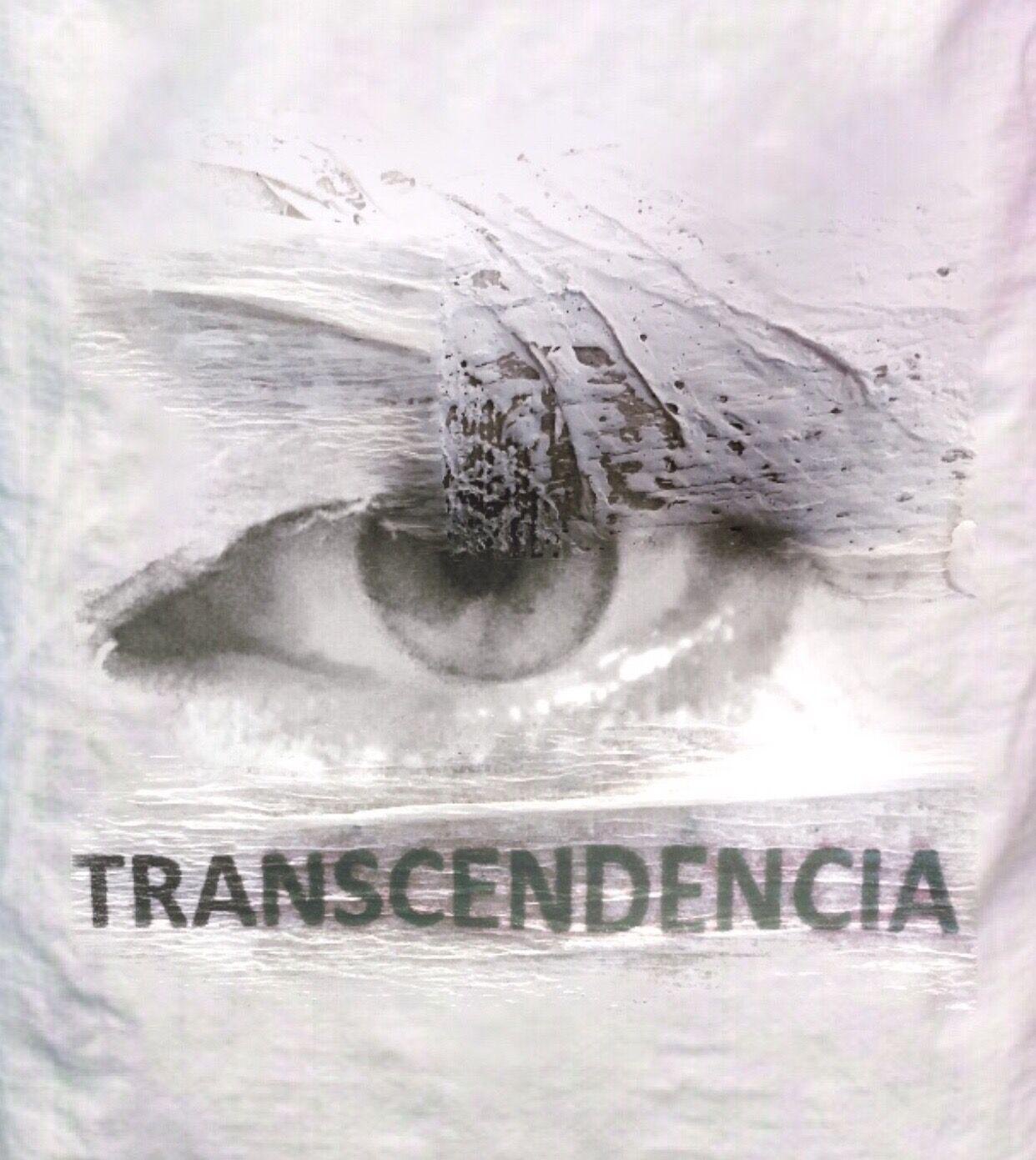 Ser y Huella by José Cosme, intervened eye image bearing the word Transcendencia