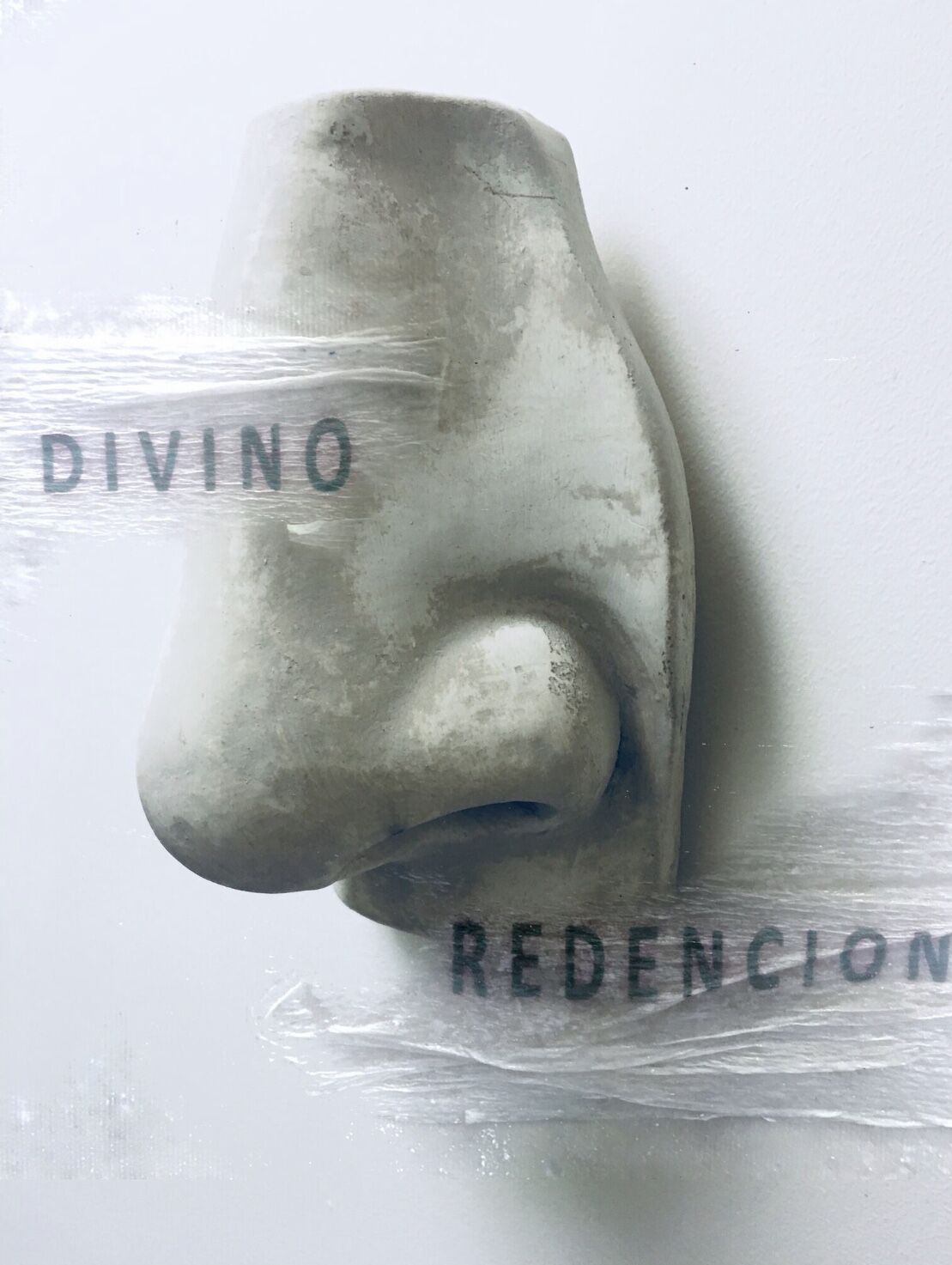 El Todo y la Nada by José Cosme, intervened image bearing the words Divino and Redención